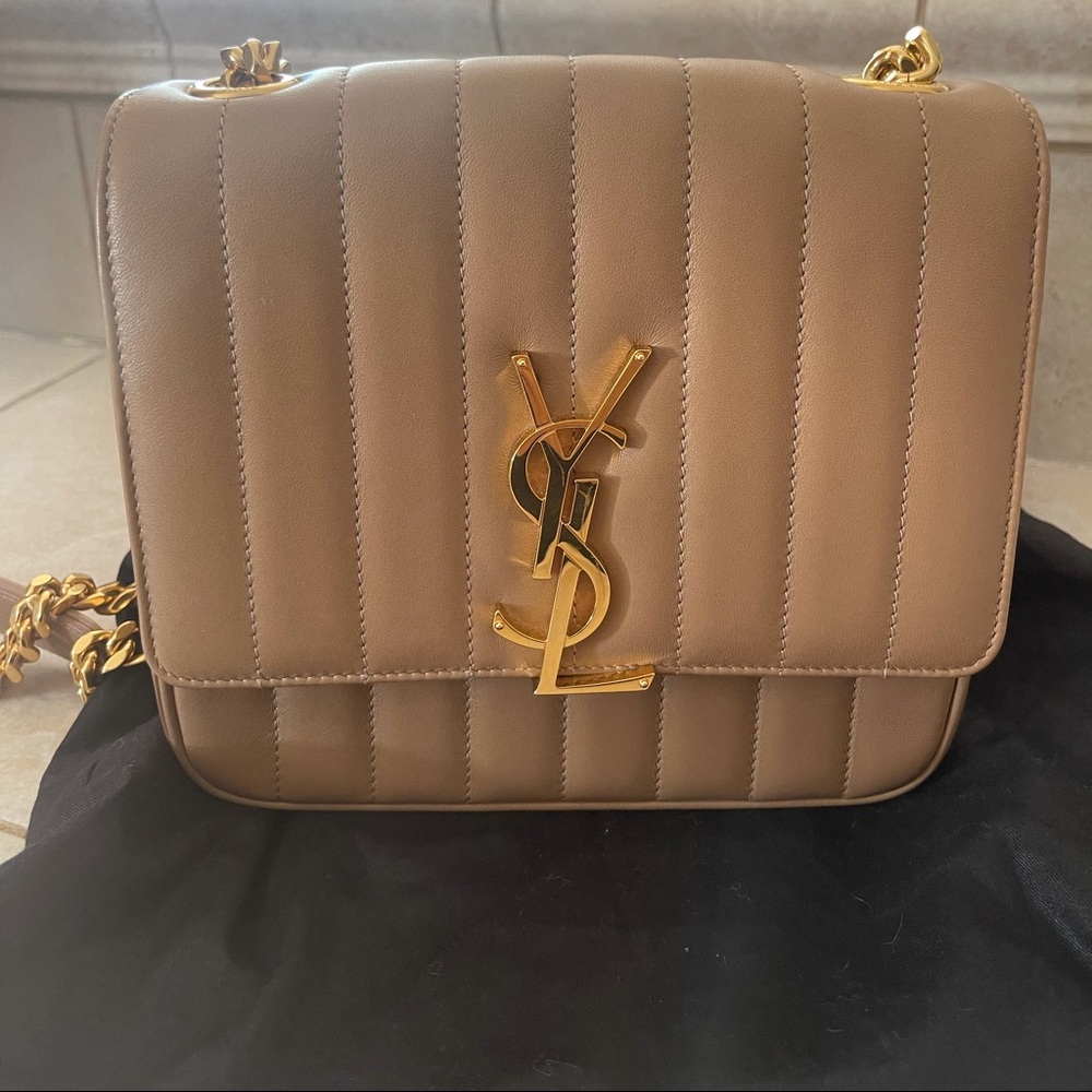 Ysl crossbody color beige  .used one time only .